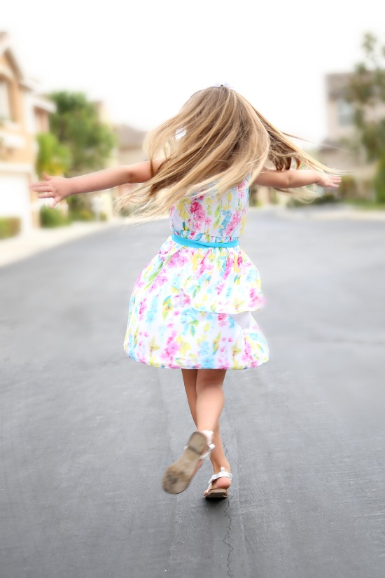 Audrey Grace twirls in her new Easter Dress from Walmart.jpg